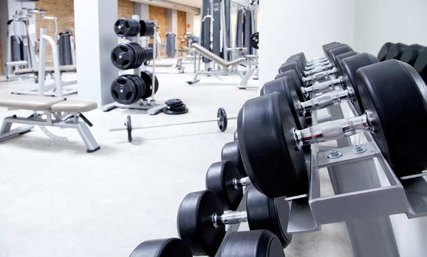 bigstock-Fitness-club-weight-training-e-29109284