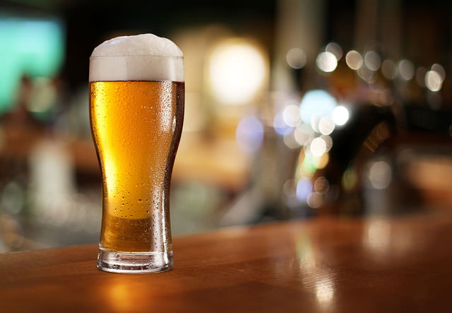 bigstock-Glass-of-light-beer-on-a-dark--39730978