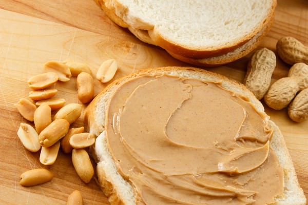 bigstock-Peanut-Butter-On-Bread-With-Pe-13614866