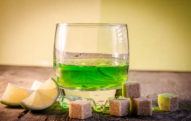 bigstock-Glass-Of-Absinthe-With-Lime-An-58199072