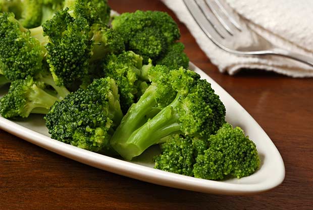 bigstock-Freshly-steamed-broccoli-on-pl-43337083