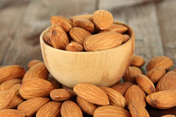 bigstock-Almond-in-wooden-bowl-on-wood-48279077