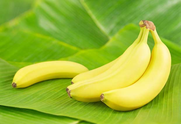 bigstock-Fresh-bananas-on-banana-leaves-46823329