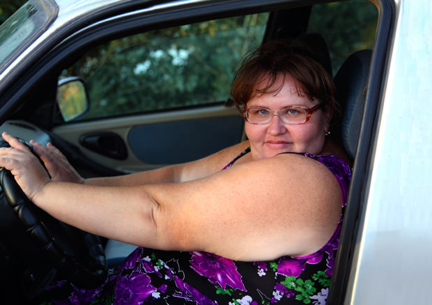 overweight woman behind the wheel
