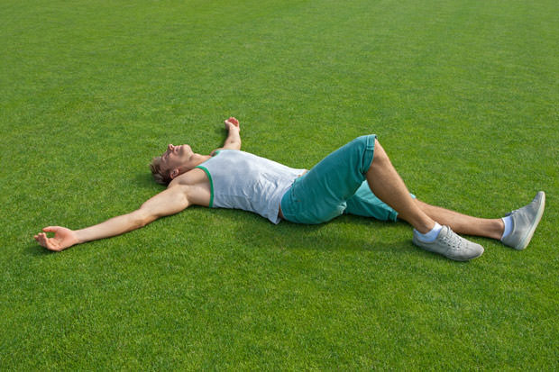 bigstock-Sporty-Guy-Relaxing-On-Green-T-36762511