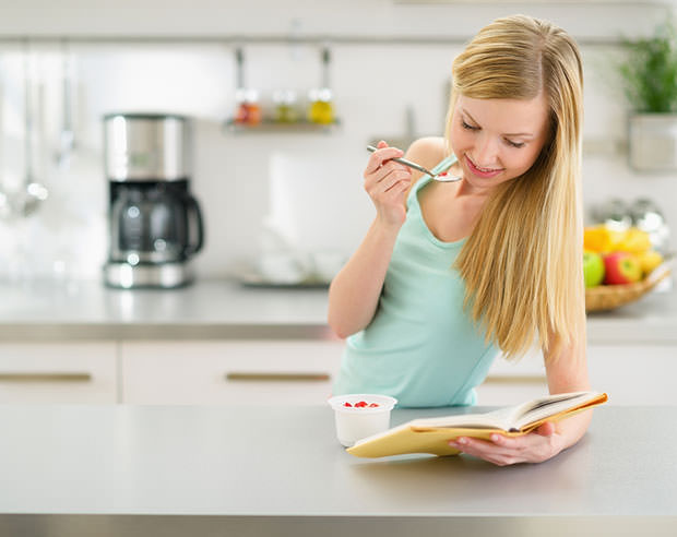 bigstock-Happy-Teenager-Girl-Reading-Bo-45648277