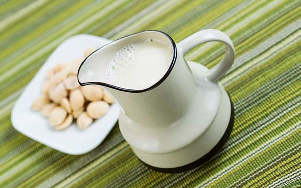bigstock-Almond-Milk-In-Pourer-With-Alm-52364242