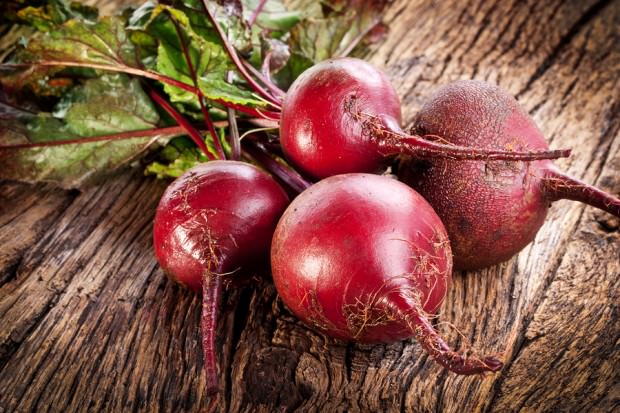 bigstock-Beet-roots-on-a-old-wooden-tab-45753544 