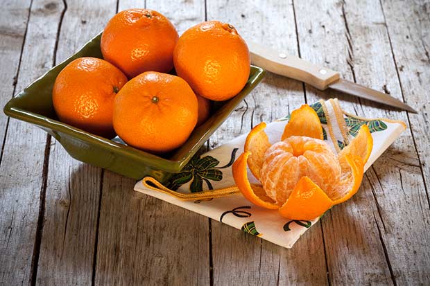 bigstock-Bowl-With-Honey-Tangerines-51924016