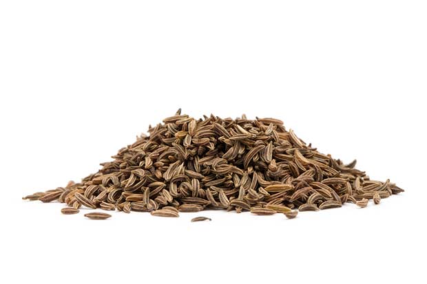 bigstock-Pile-of-cumin-seeds-isolated-o-53002282