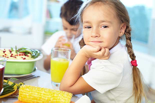 bigstock-Portrait-of-happy-girl-sitting-37361662