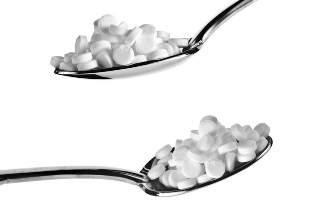bigstock-Sugar-substitute-pills-in-a-sp-22425923