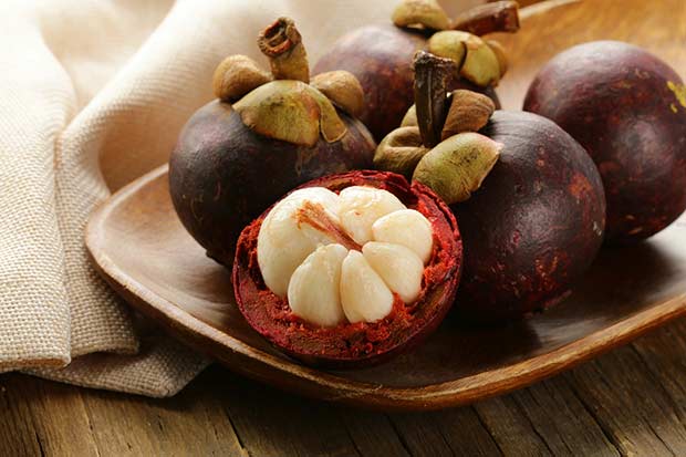 bigstock-fresh-exotic-fruit-mangosteen--43067083