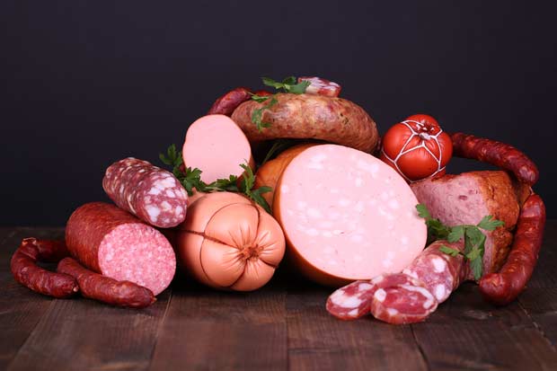 bigstock-Lot-of-different-sausages-on-w-59560544
