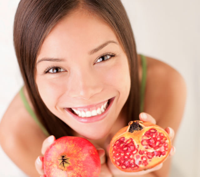 Pomegranate fruit woman