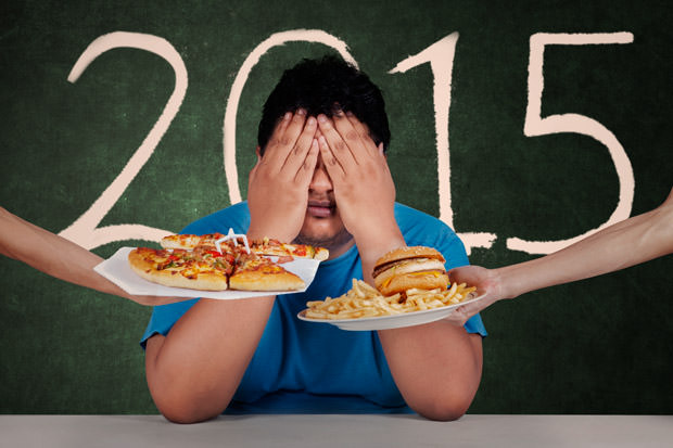 Overweight man avoid junkfood in 2015