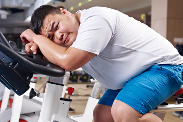 overweight man exercising